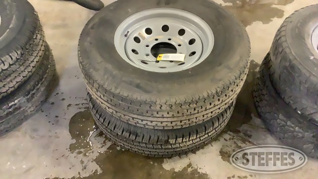 (2) ST235/80R16 Tires Mounted on 8 Bolt Wheels
